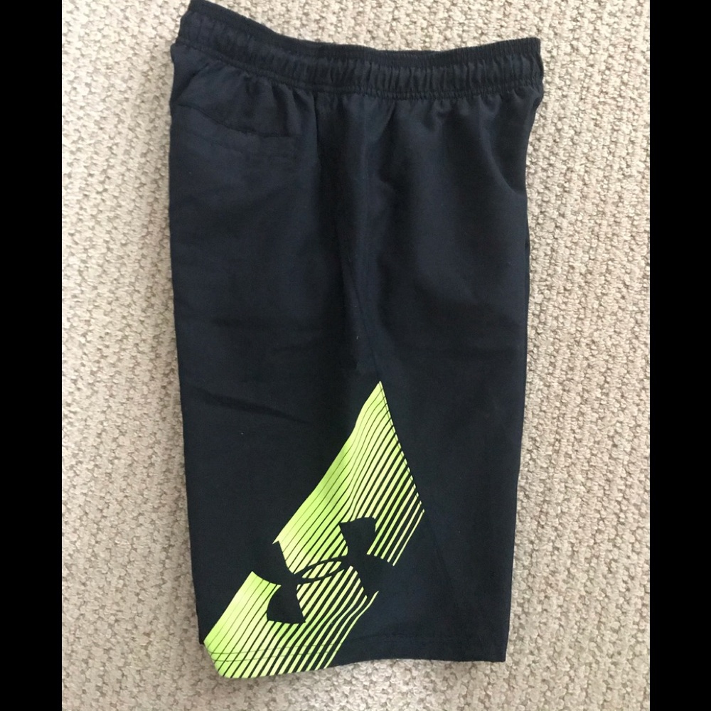Black and neon yellow under armor swim trunks